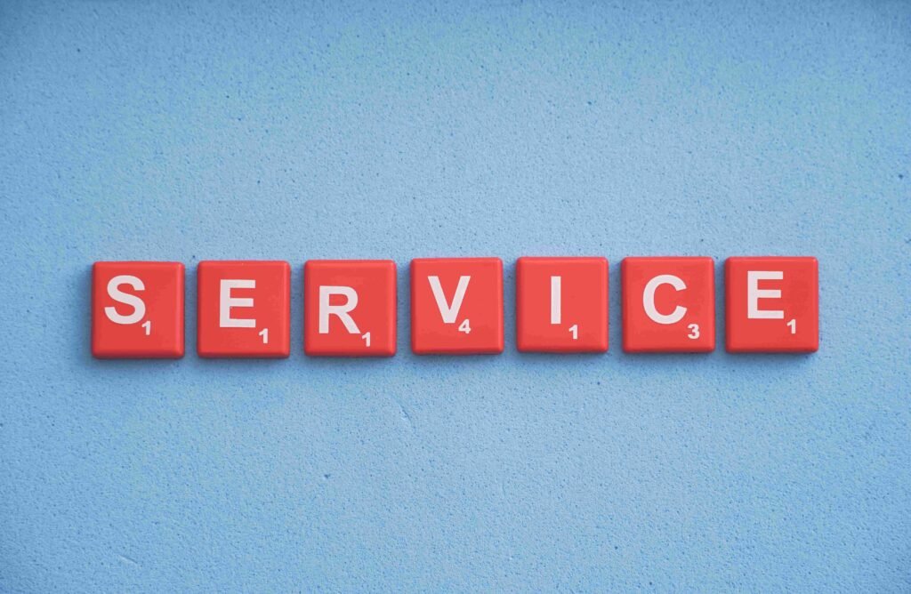 Red letter tiles spelling "SERVICE" on a blue background. - best digital marketing company in Kochi